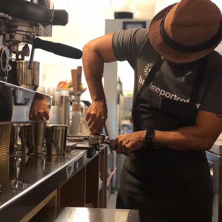 Man working espresso machine